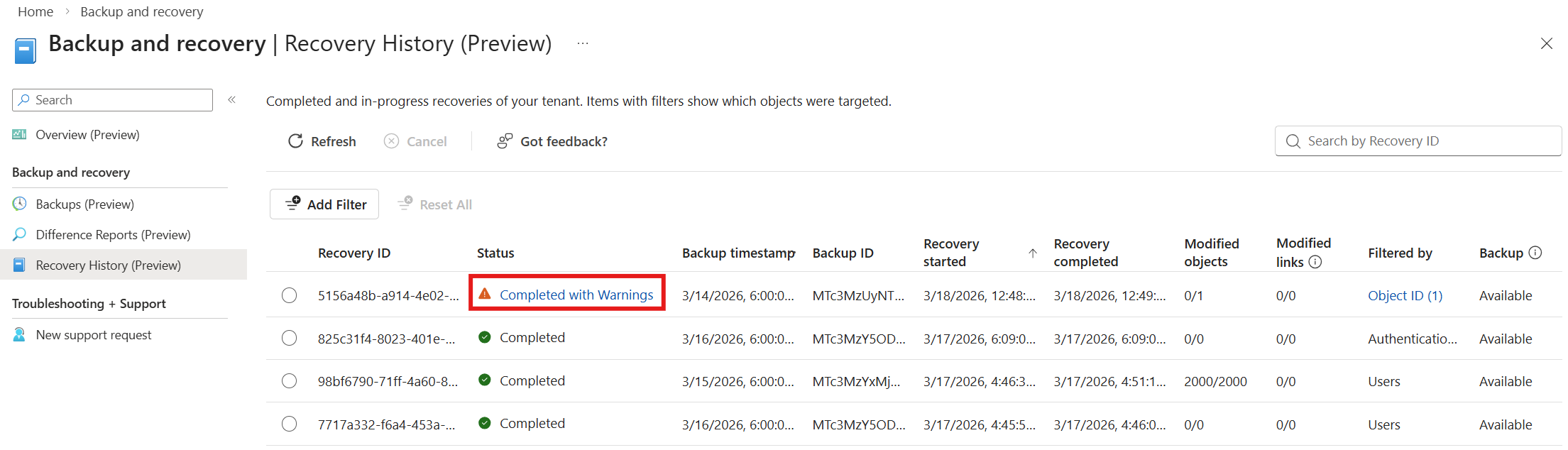 Screenshot of the Recovery History page with a Completed with Warnings entry highlighted in the Status column.