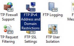 Screenshot che mostra il riquadro Home di contoso dot com, con L'opzione F T P I P v 4 Address and Domain Restrictions selezionata.