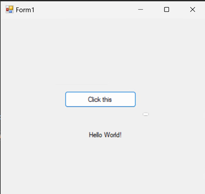 Skärmbild som visar dialogrutan Formulär1 som innehåller knappen och en etikett.