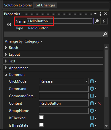 截圖顯示在 Visual Studio 2022 中的方案總管屬性視窗，用於「HelloButton」單選按鈕。